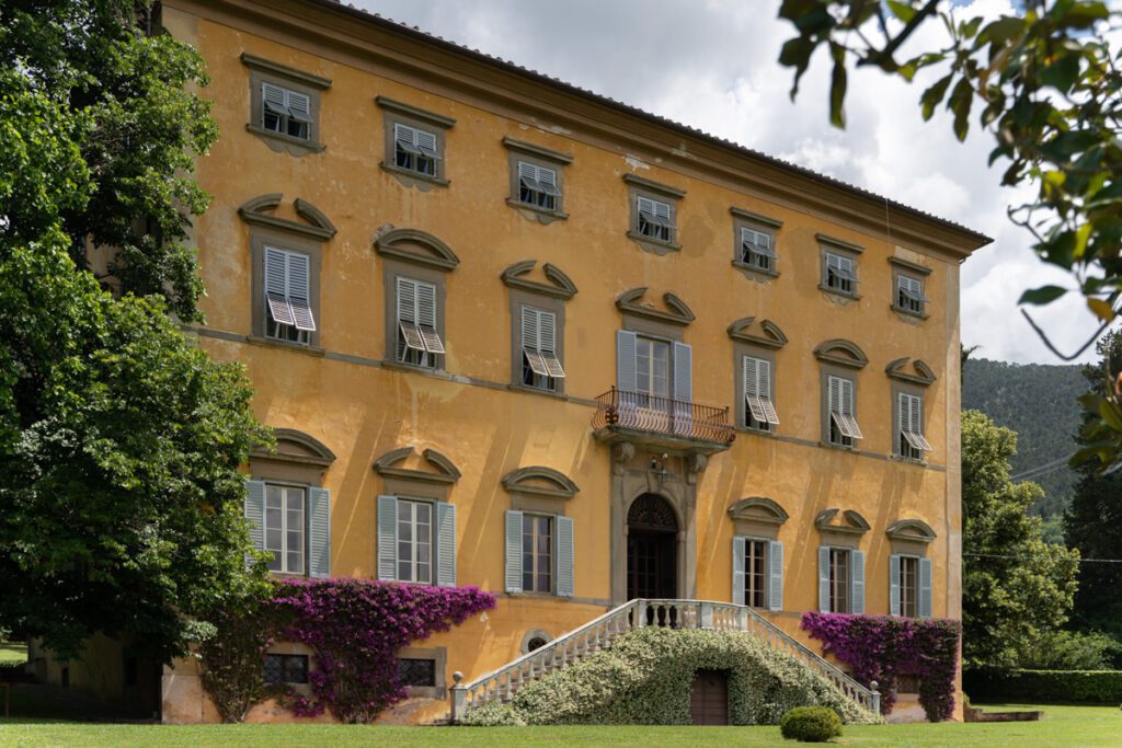 Historic facade of Villa Lungomonte in Tuscany.