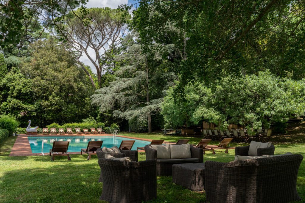 Crystal clear private pool overlooking the iconic Tuscan landscapes.