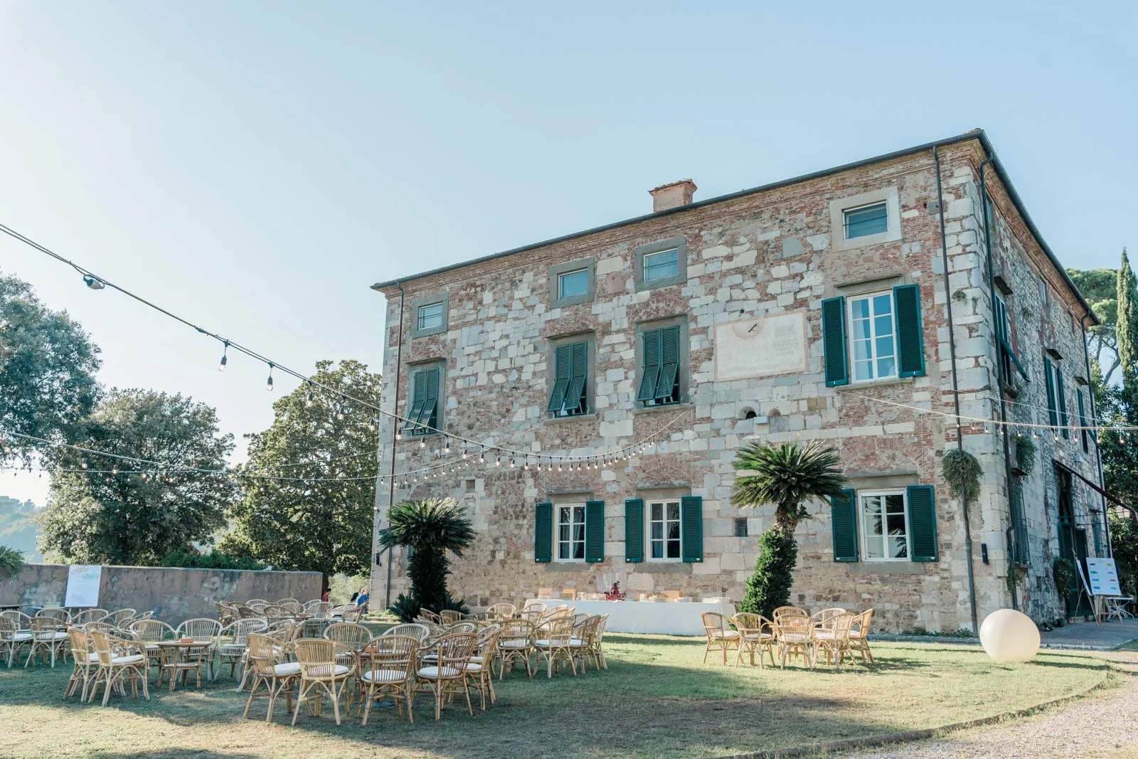 An expansive Tuscan villa representing the quintessential Italian countryside experience.